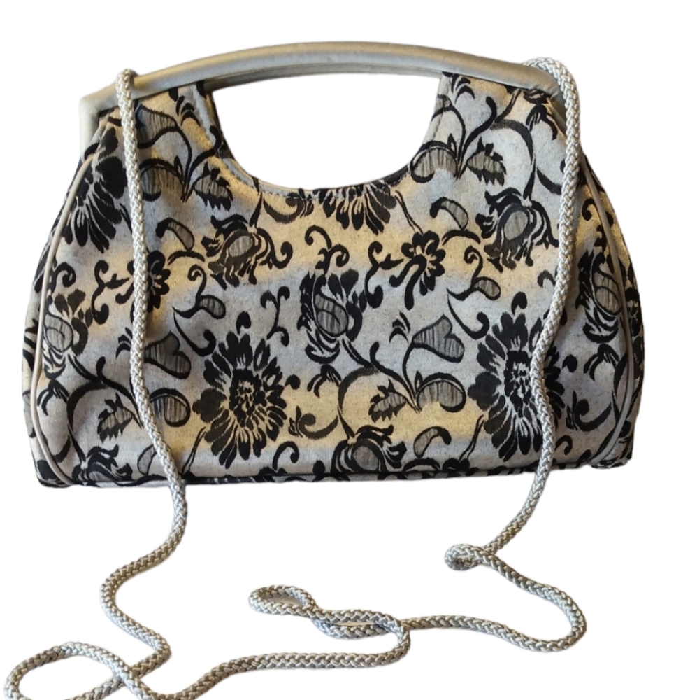 Valerie Stevens Silver and black woman's purse.